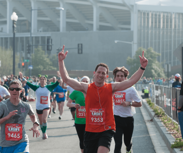 Marathon runners celebrating