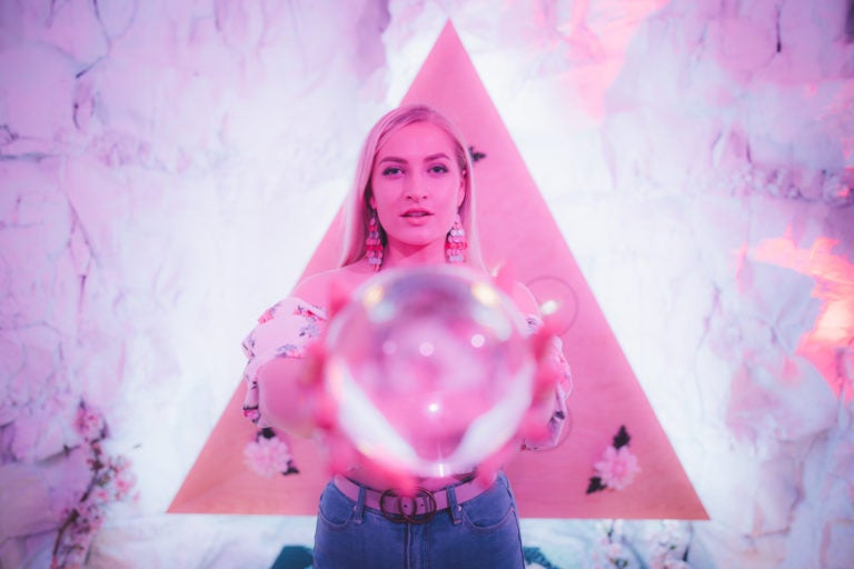 Person taking part in art experience exhibit