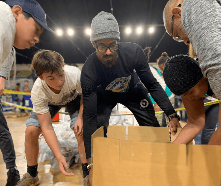 People opening a box