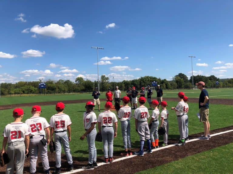 Little league baseball team lined up