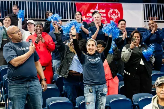 Audience cheering for the basketball game