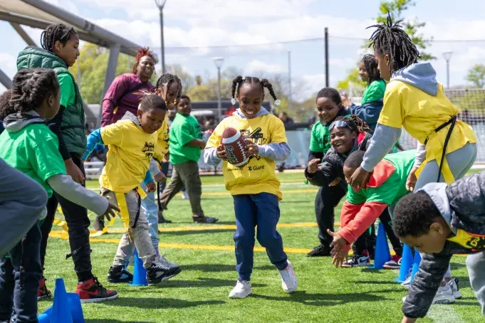 Kids playing football at the event