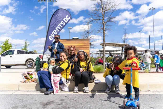 Kids posing for a picture at the event