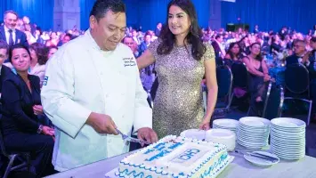 Chef Perez cuts his cake