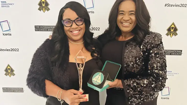 Events DC Director of Performance Excellence LaShell Mindingall and Chief Administrative Officer Misty Johnson Oratokhai accept the Stevie Award.