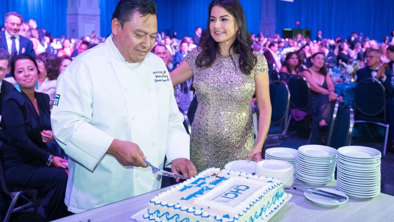 Chef Perez cuts his cake